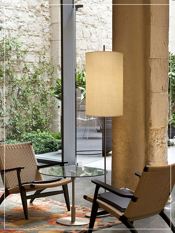 Cylindrical Floor Lamp made of Rattan in a house.
