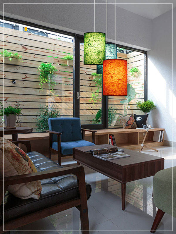 Cylinder shaped Pendant lamp shade made of rice paper in a house.
