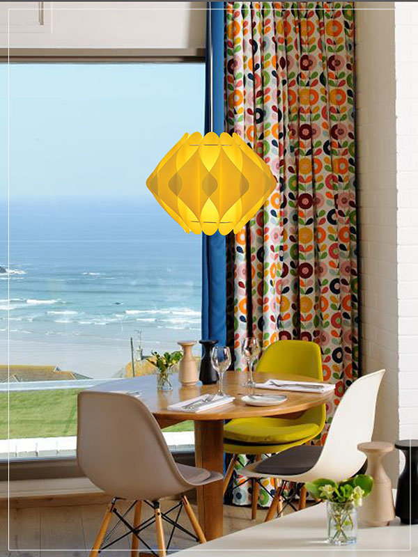 Contemporary Pendant Light Fixture Saporo in yellow in a house.