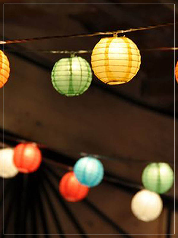 Garland with multicolor lanterns in an event.