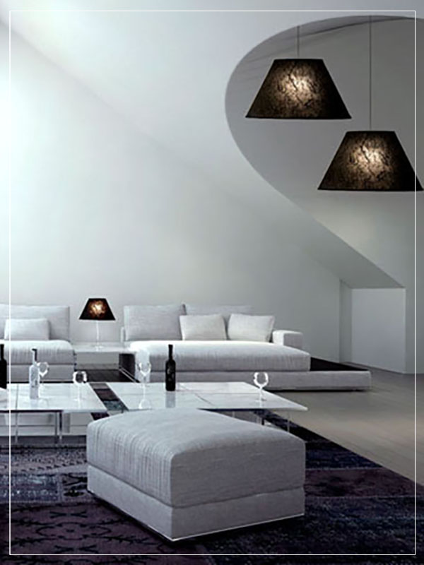 Pendant and Table Cone Lamp Shadε in a bedroom.