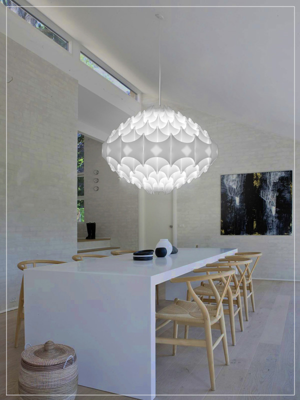 Contemporary Pendant Light Fixture Zenith in White in a Dining Room.