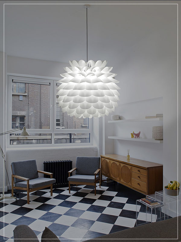 Modular Light Fixture Star in White in a Living Room.