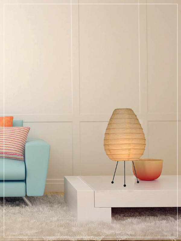 Egg shaped rice paper & baboo lamp in a living room.